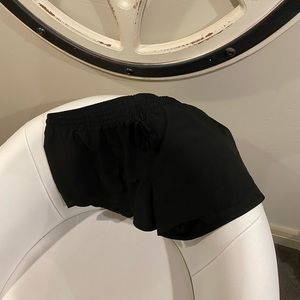 black athletic shorts.